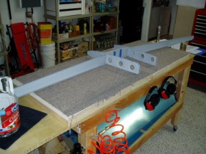 Front spar riveted and ready to receive more ribs and skin.